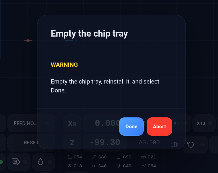 The chip-tray warning prompt in Ctrl, with Done and Abort buttons